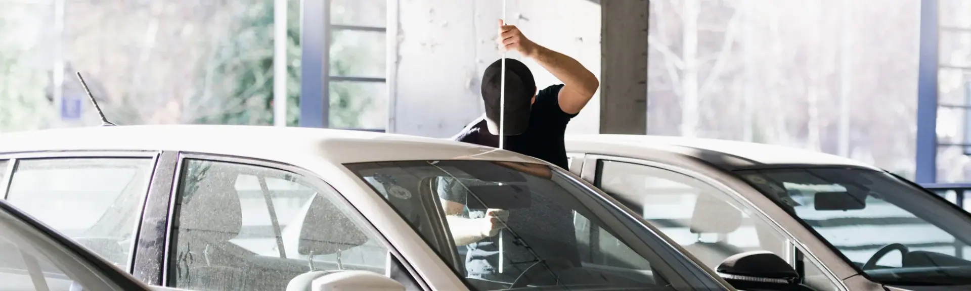 Person attempting to break into a parked car